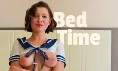 Schoolgirl in Bed Cosplay